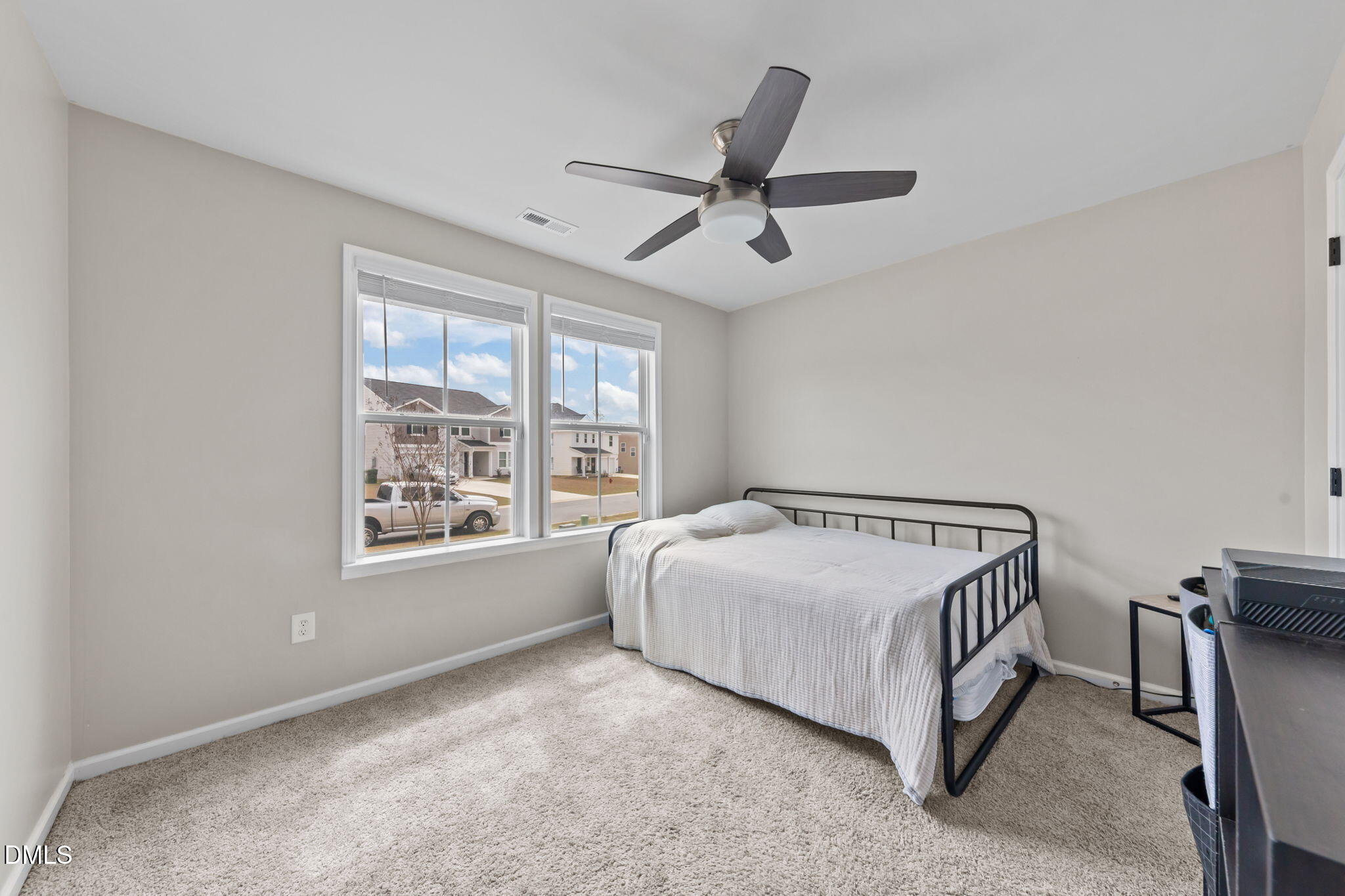 174 Cobra Lane Raeford, NC 28376 - Photo 15 of 32 a spacious bedroom with a bed and window