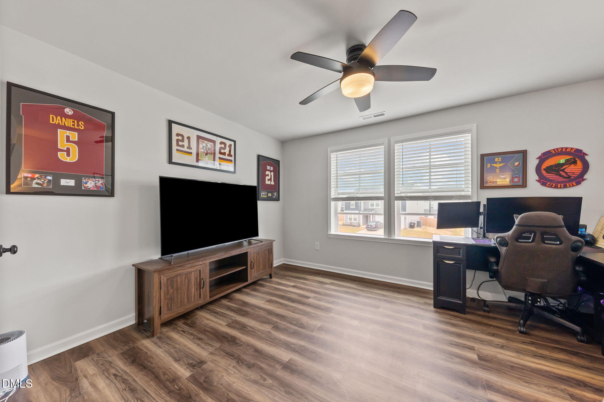 174 Cobra Lane Raeford, NC 28376 - Photo 23 of 32 a living room with furniture and a flat screen tv