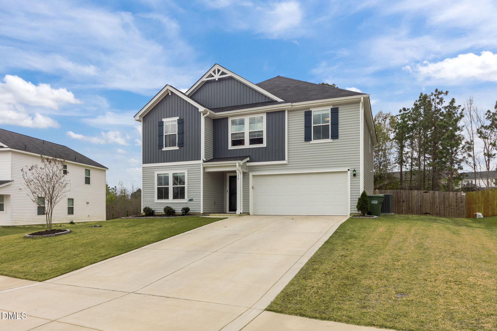 174 Cobra Lane Raeford, NC 28376 - Photo 27 of 32 a front view of a house with a yard