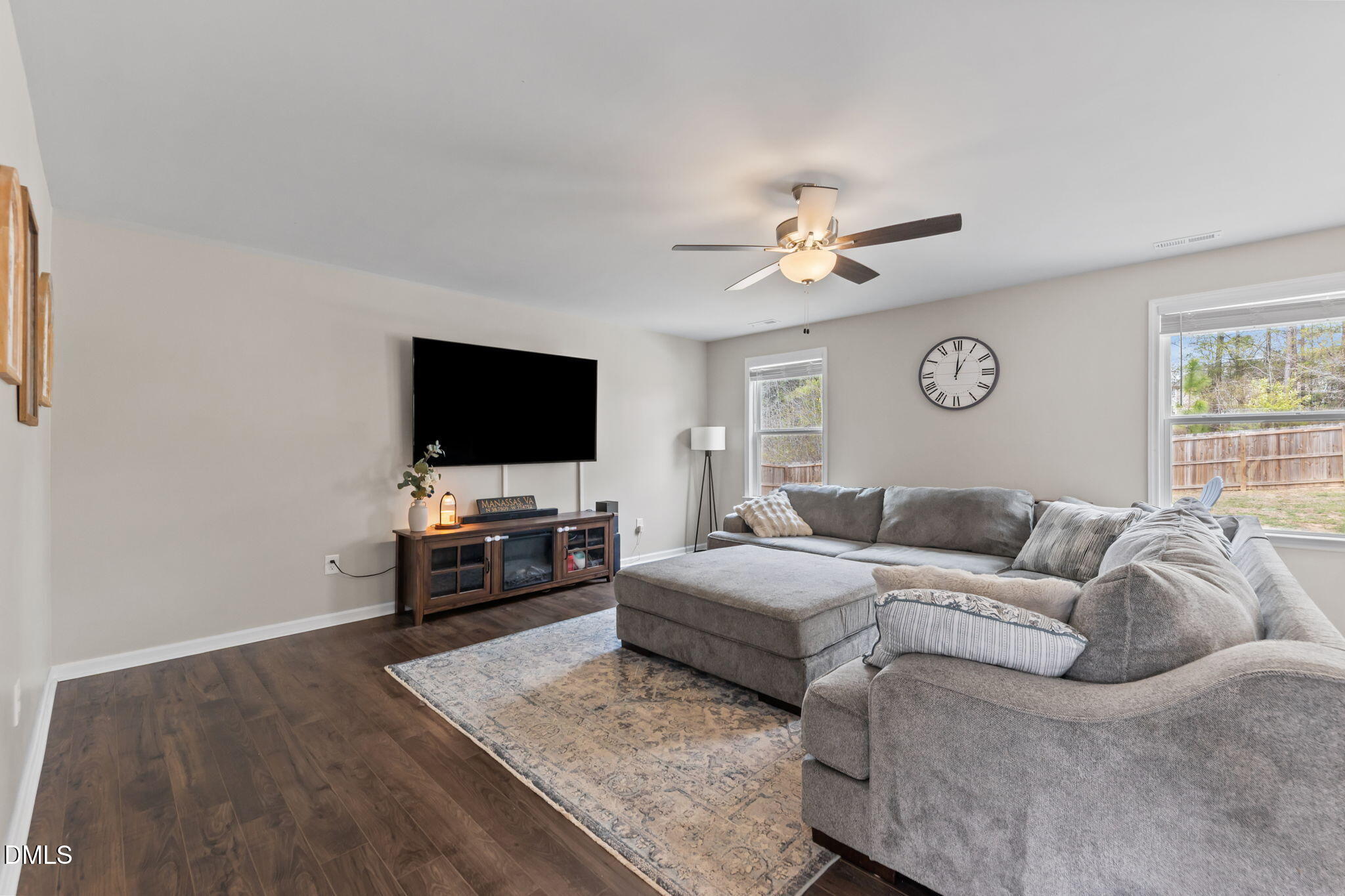 174 Cobra Lane Raeford, NC 28376 - Photo 5 of 32 a living room with furniture and a flat screen tv