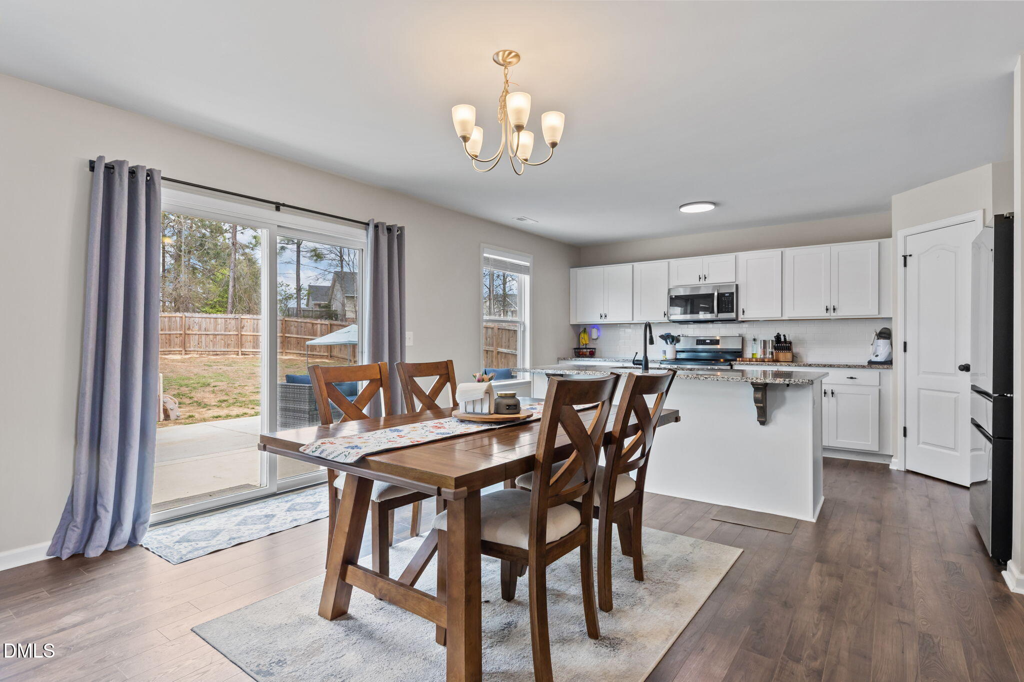 174 Cobra Lane Raeford, NC 28376 - Photo 8 of 32 a dining room with furniture and window