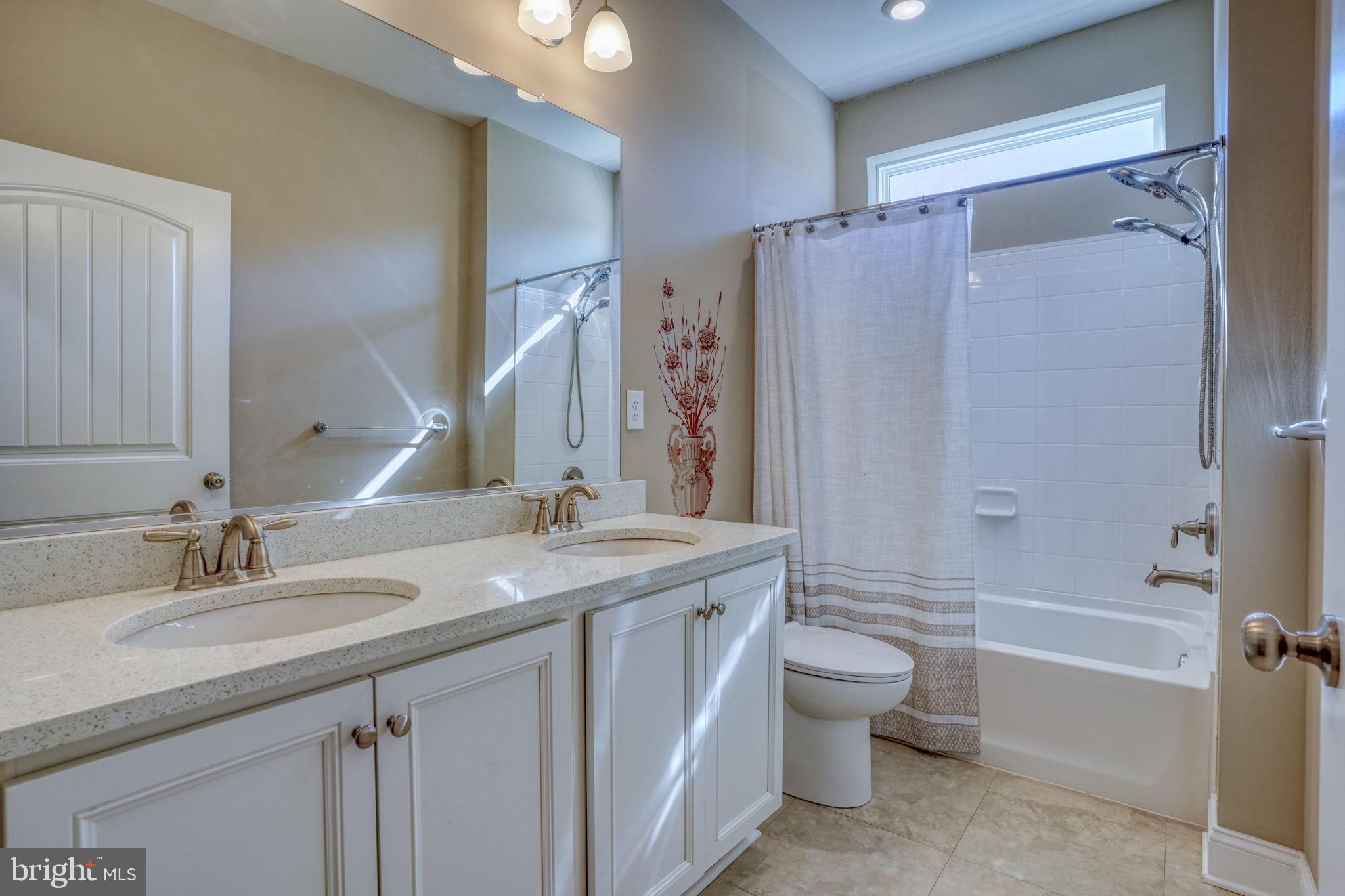 15272 Crape Myrtle Road Milton, DE 19968 - Photo 29 of 61 Elegant bathroom with modern finishes.