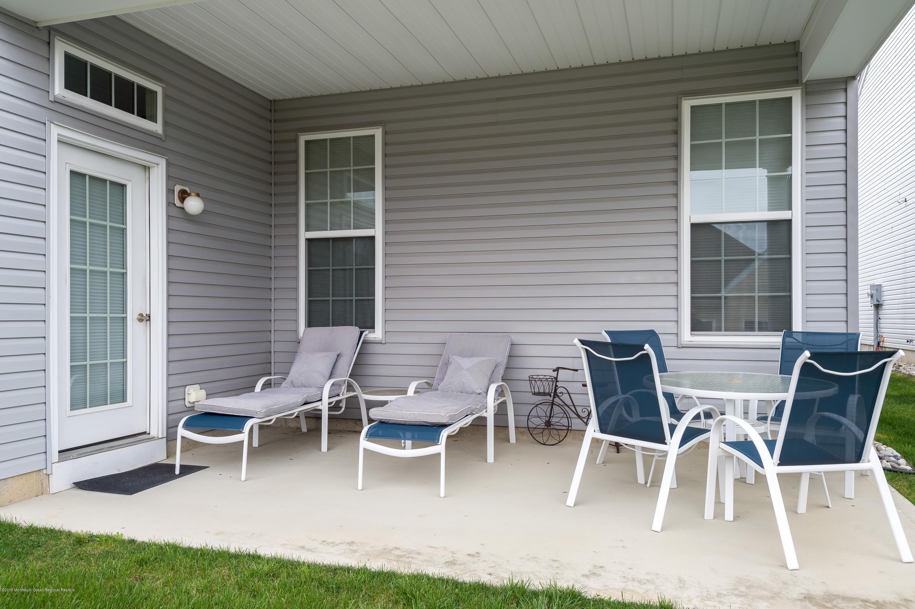 39 Kings Mill Road Monroe Township, NJ 08831 - Photo 16 of 26 Cozy Patio with Overhang