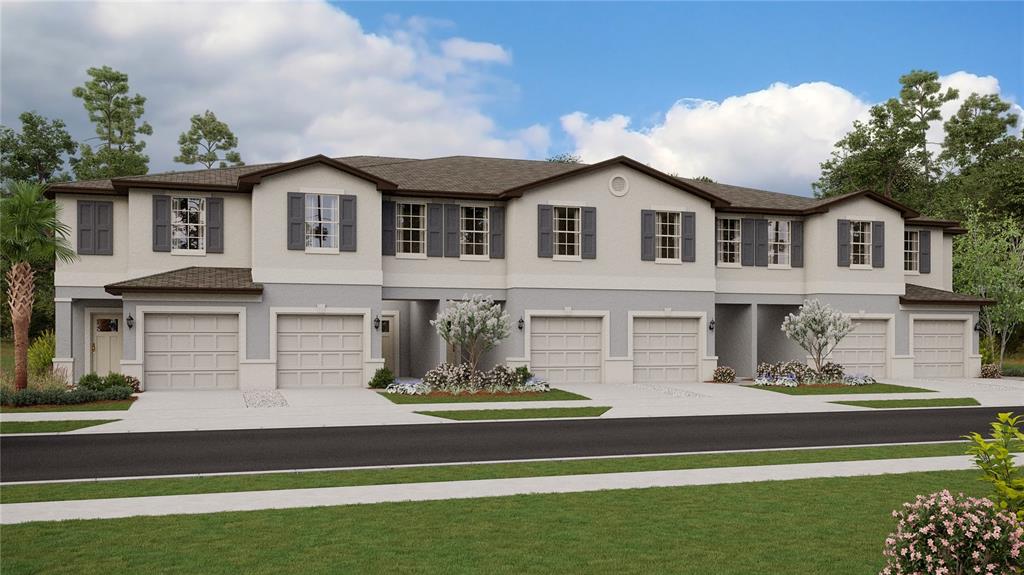 2136 Cerulean Sky Way Lutz, FL 33558 - Photo 1 of 1 a view of house with garden