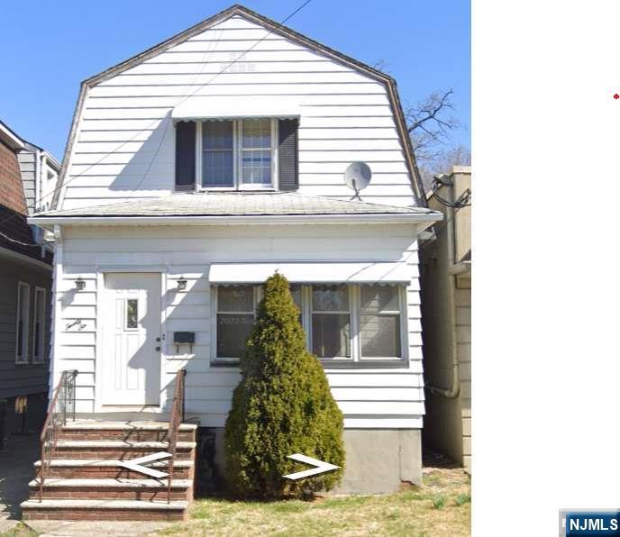 26 Van Orden Place Hackensack, NJ 07601 - Photo 1 of 6 a front view of a house