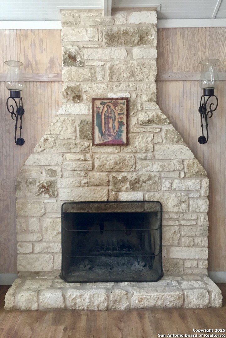 512 County Road 348 Concan, TX 78838 - Photo 24 of 39 a close view of a fireplace in empty room