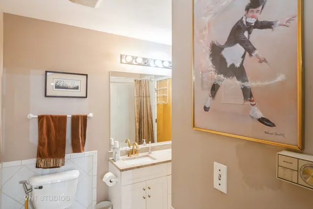 a bathroom with a mirror and a sink