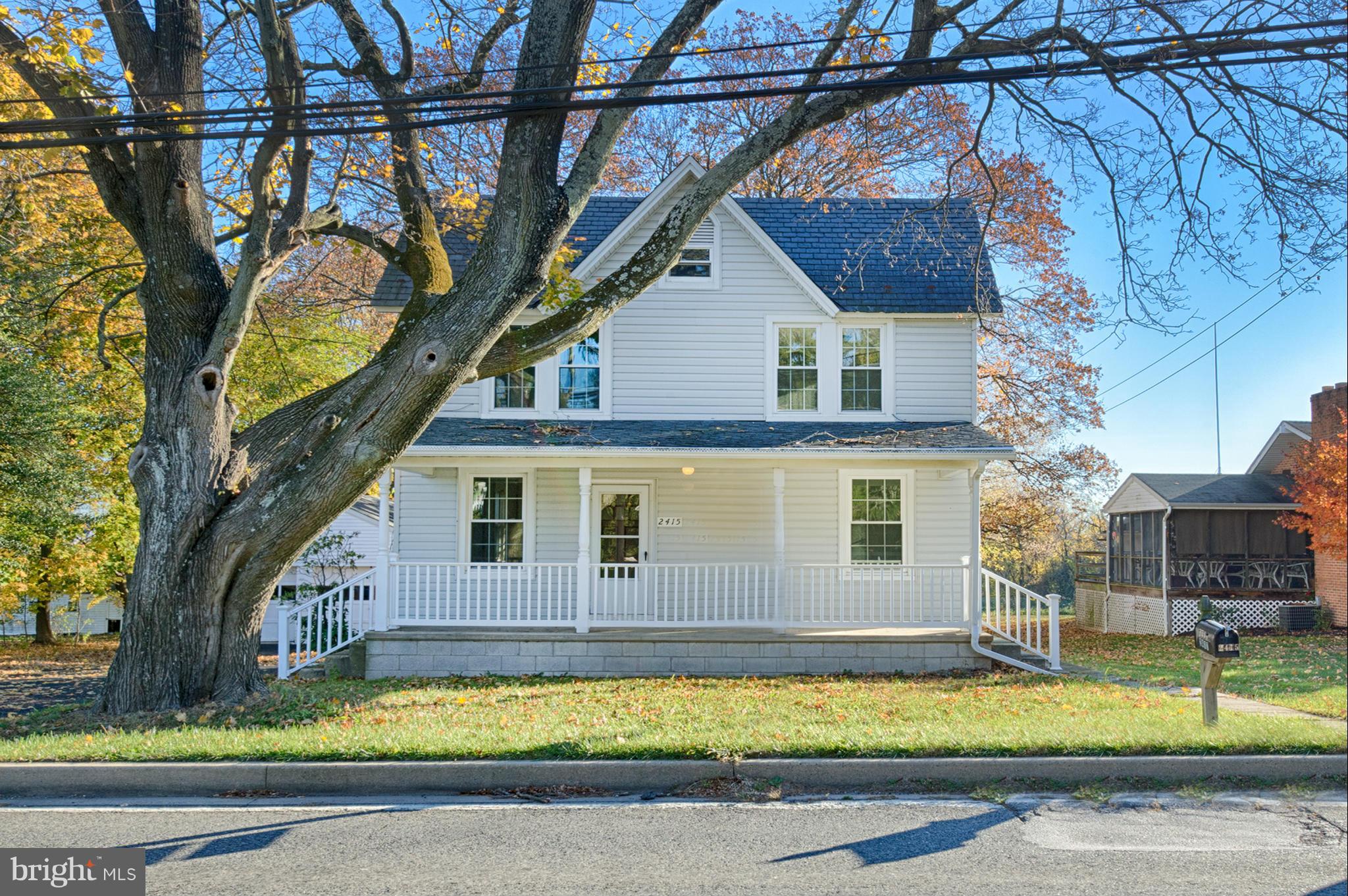 2415 Rocks Road Forest Hill, MD 21050 - Photo 4 of 30 a front view of a house with a yard and swimming pool
