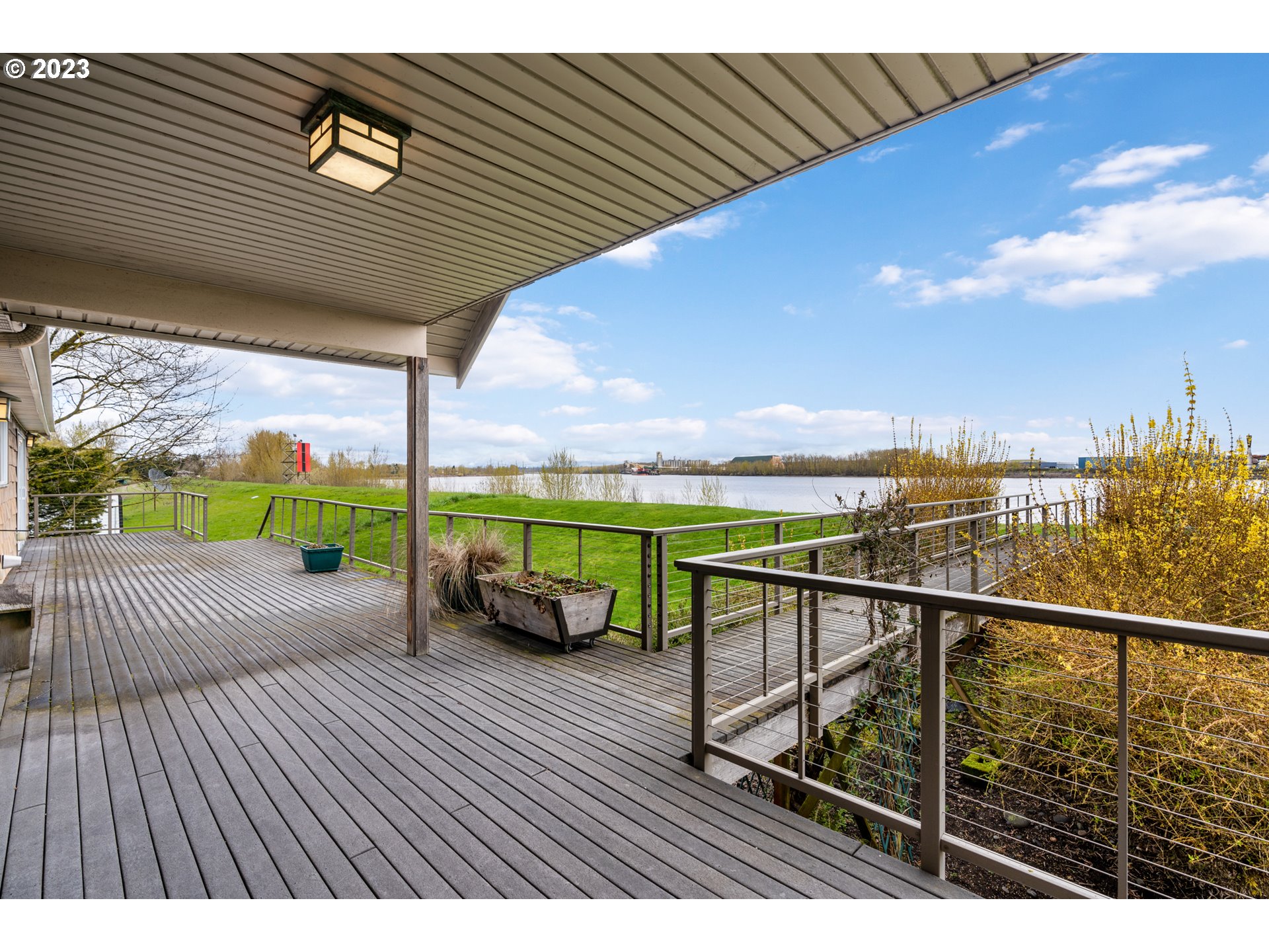 15140 Northwest Gillihan Road Portland, OR 97231 - Photo 4 of 34 a view of a patio with wooden floor
