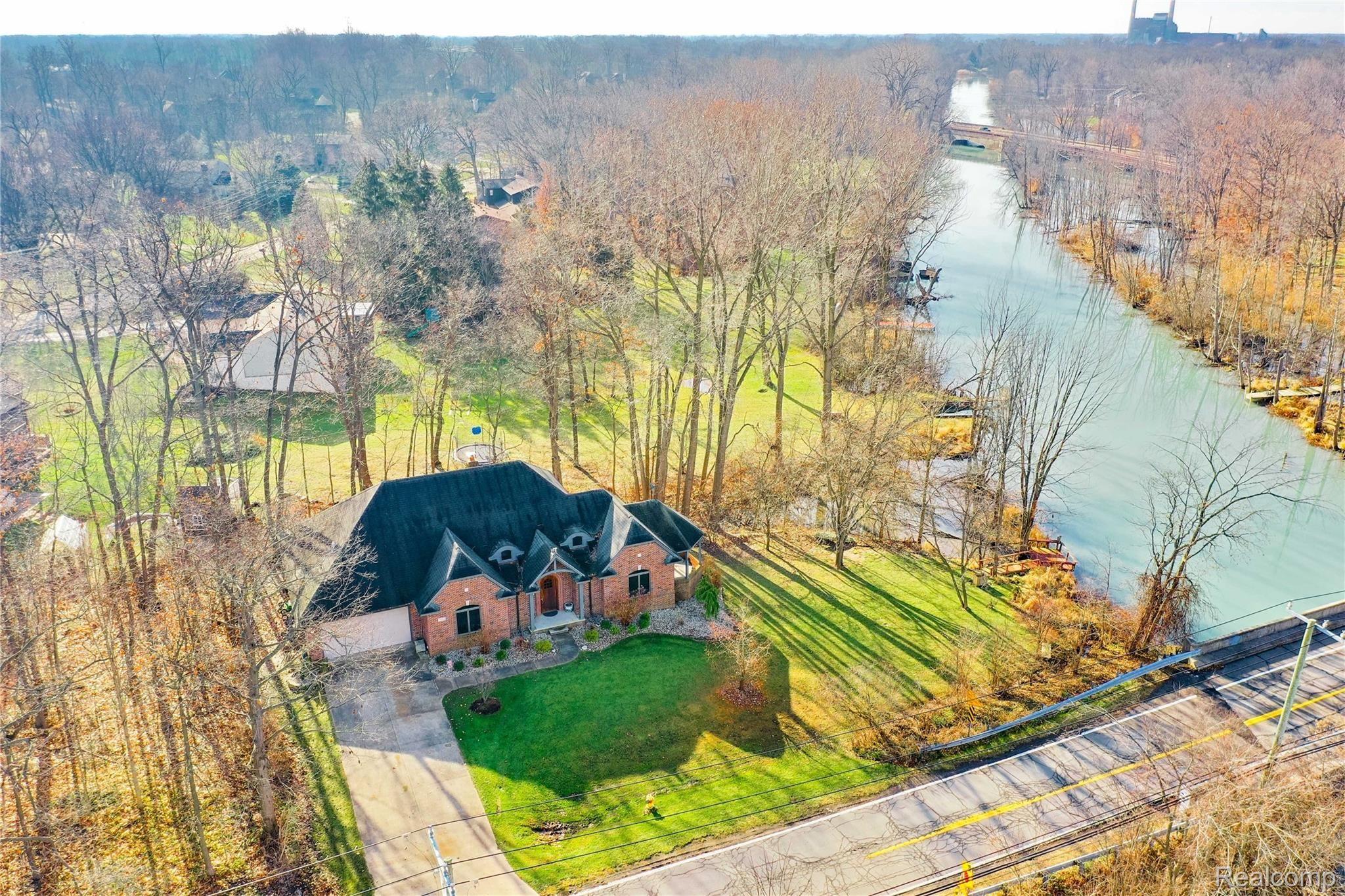 9001 Ferry Road Grosse Ile, MI 48138 - Photo 2 of 36 9001 Ferry, Grosse Ile - Detroit River Canal on West Side of Property