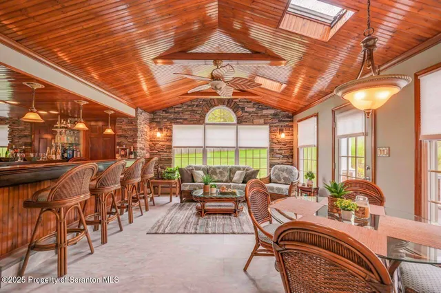 a kitchen with stainless steel appliances granite countertop a stove and a sink