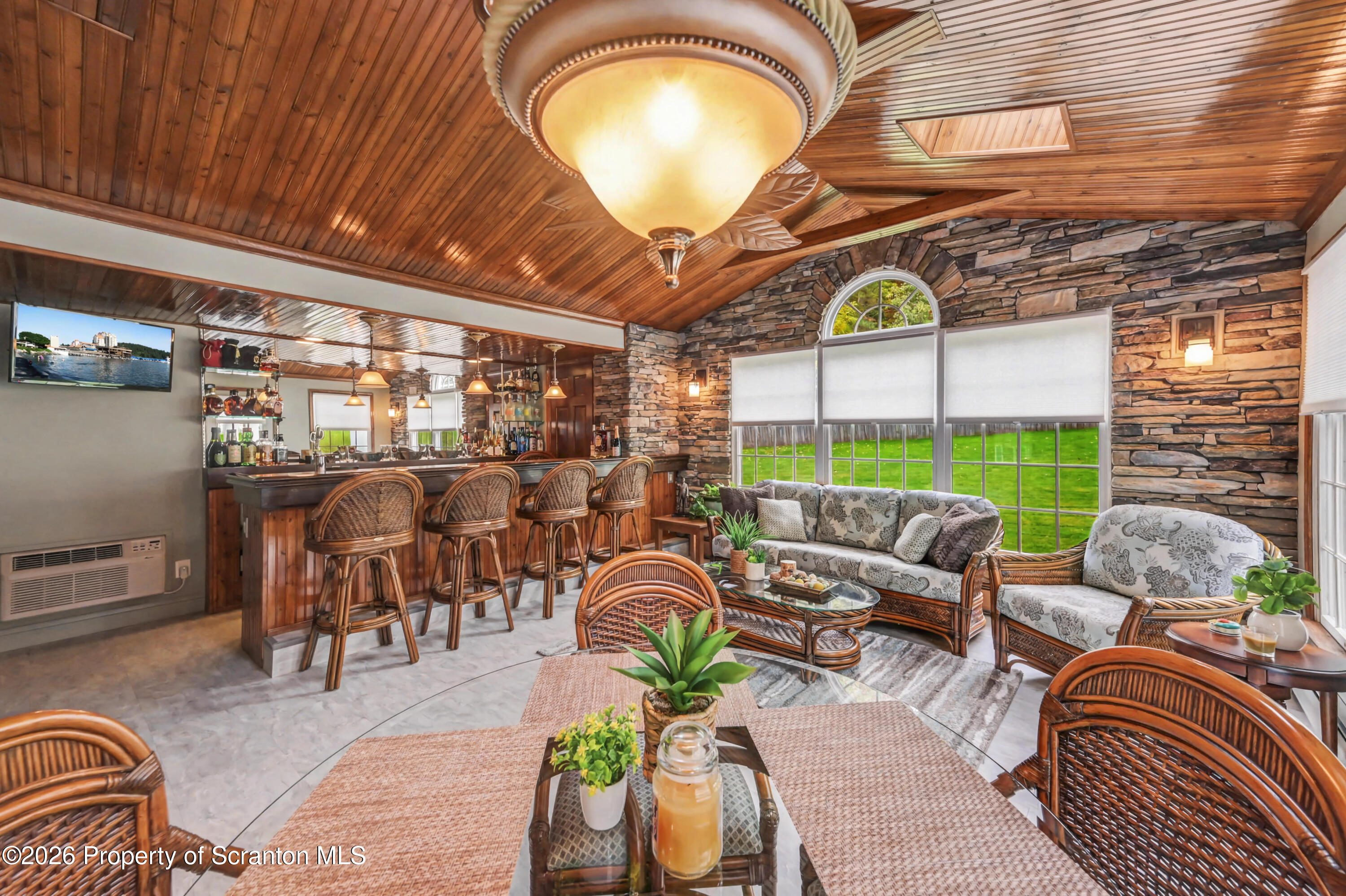 317 Bailey Street Clarks Summit, PA 18411 - Photo 17 of 95 a view of a dining room with furniture one side kitchen view and wooden floor