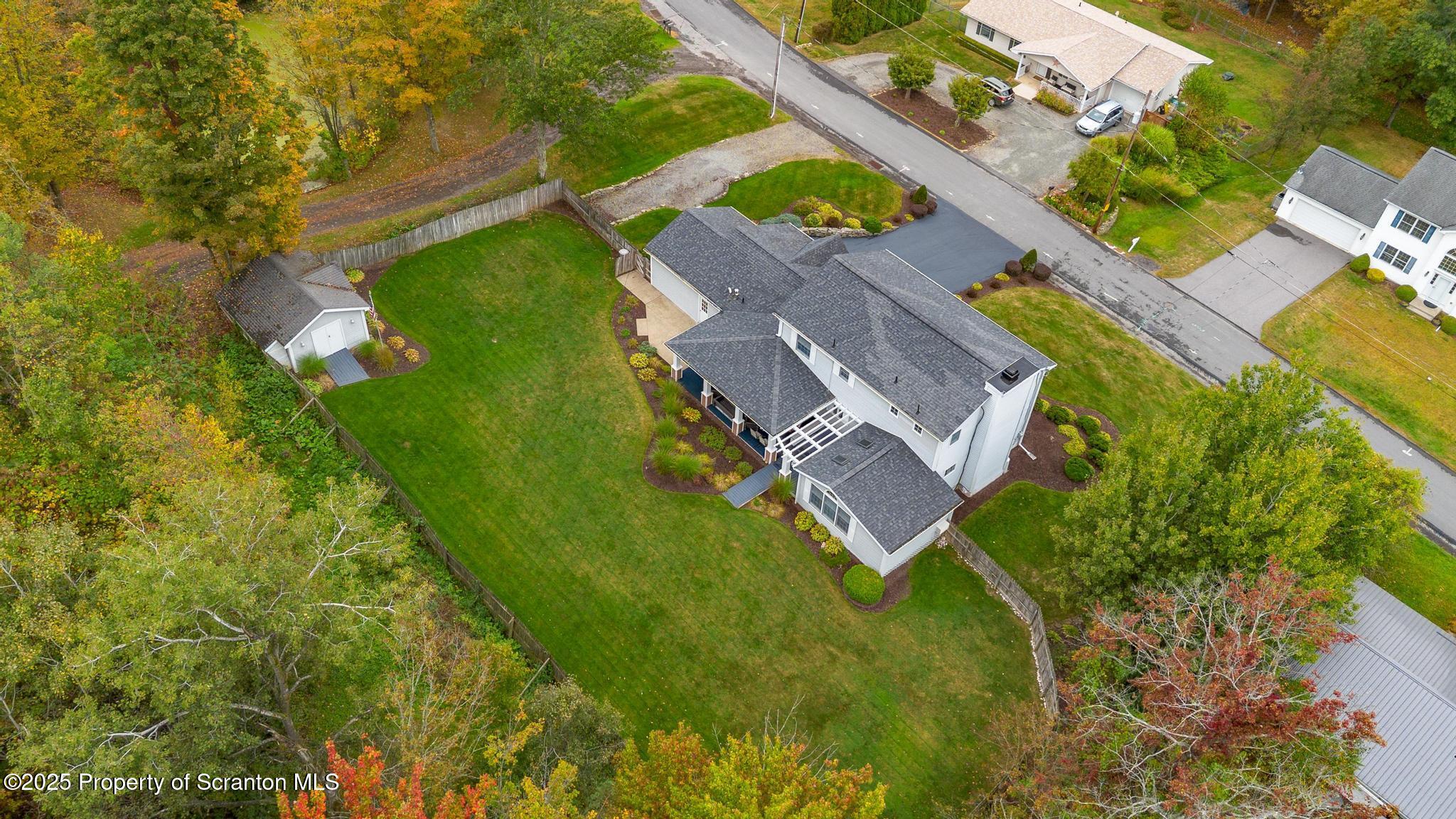 317 Bailey Street Clarks Summit, PA 18411 - Photo 25 of 95 an aerial view of residential house with outdoor space