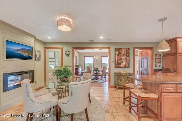 a bathroom with a sink mirror and toilet