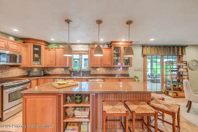 a bedroom with a bed closet and flat screen tv
