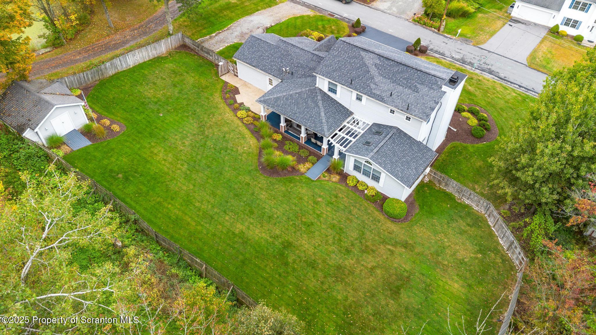 317 Bailey Street Clarks Summit, PA 18411 - Photo 30 of 95 an aerial view of a house with a garden