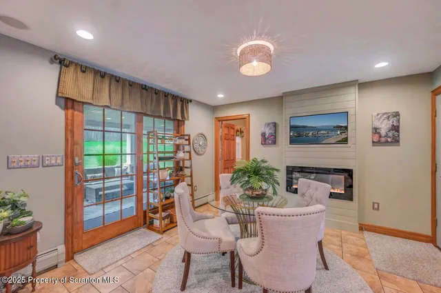 a bed room with a bed and a television