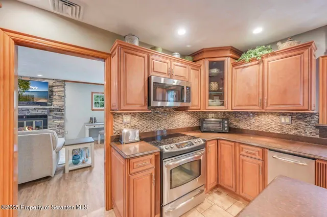 a bedroom with a bed and a table