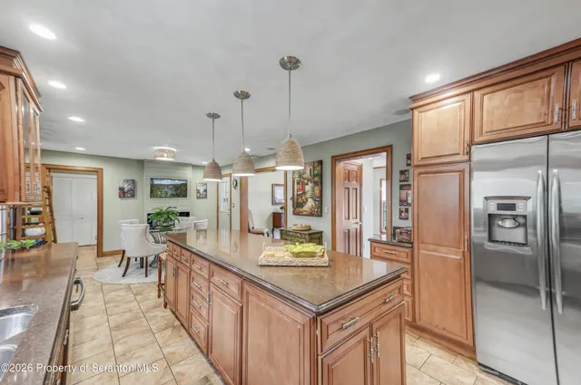 a bedroom with a bed and a table in it