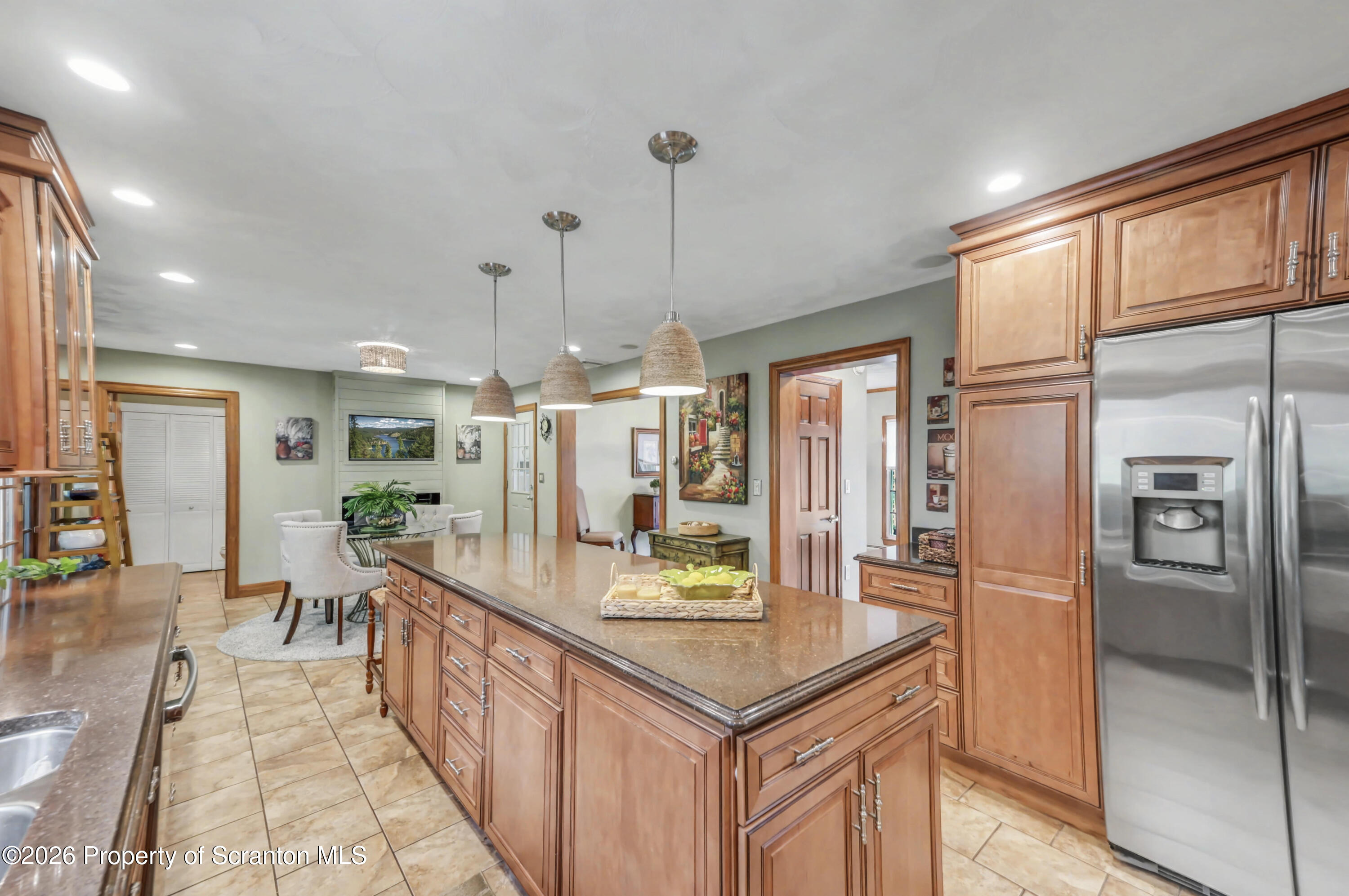 317 Bailey Street Clarks Summit, PA 18411 - Photo 34 of 95 a kitchen with stainless steel appliances granite countertop a refrigerator a oven and a sink