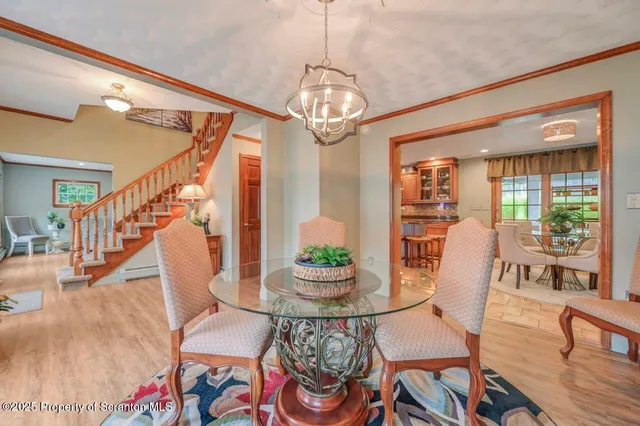 a spacious bathroom with a granite countertop sink and a mirror