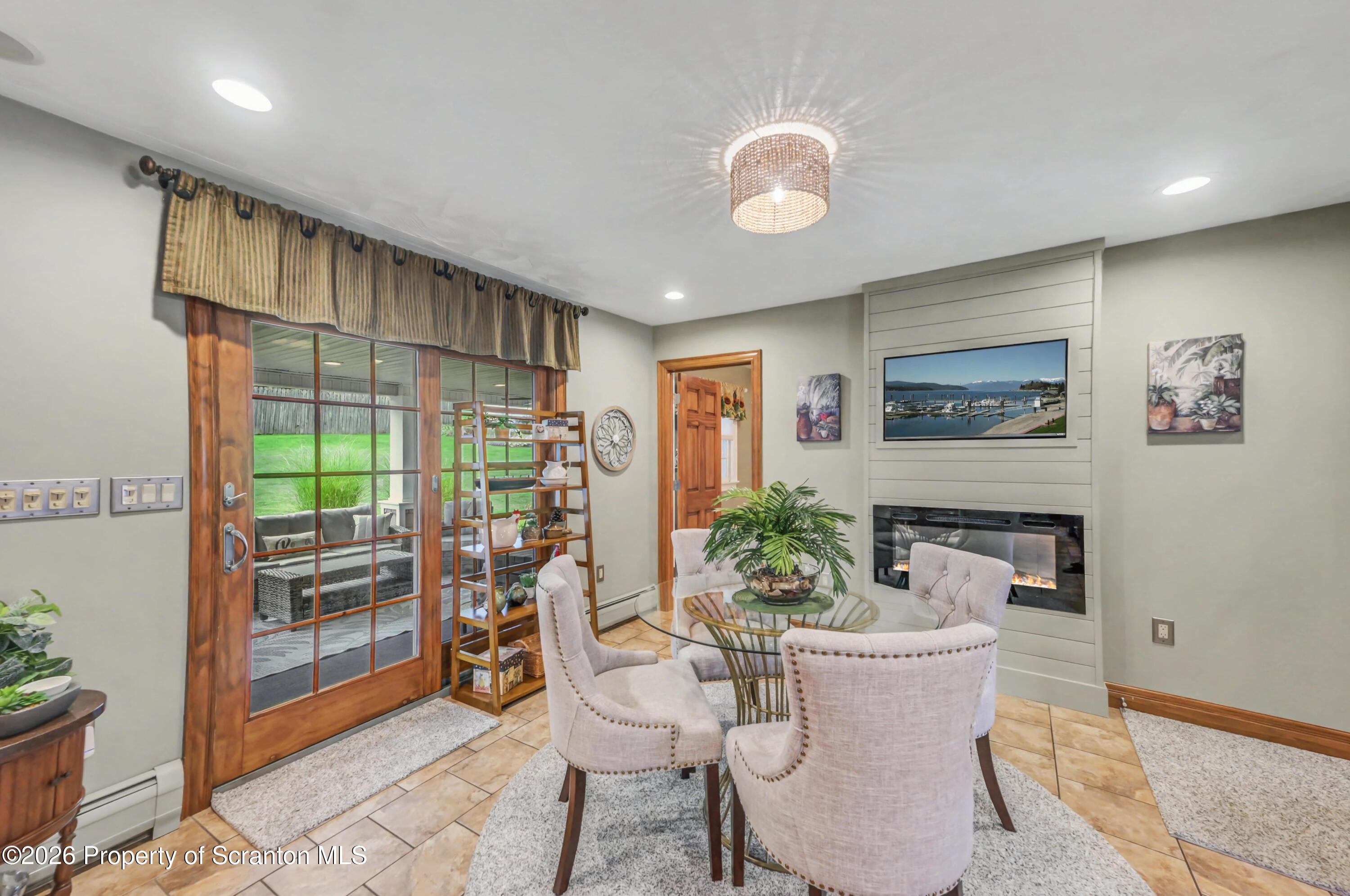 317 Bailey Street Clarks Summit, PA 18411 - Photo 35 of 95 a living room with furniture and a large window