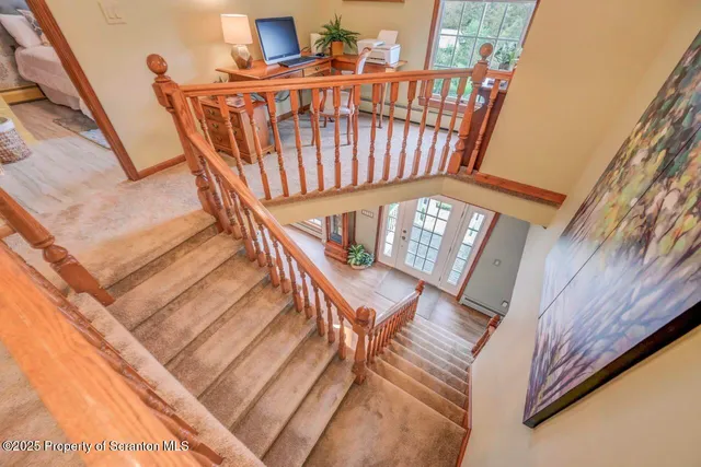 a front view of a house with a yard and porch