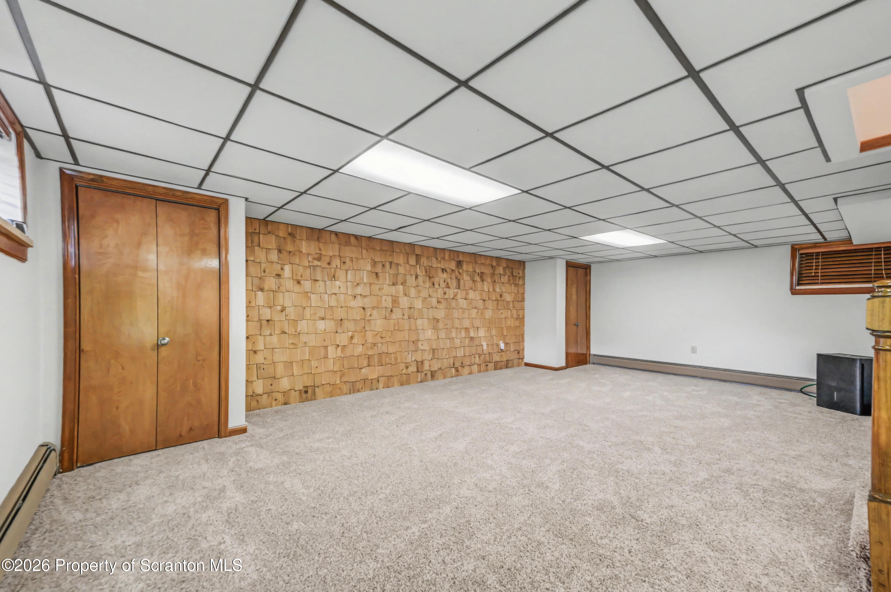 317 Bailey Street Clarks Summit, PA 18411 - Photo 77 of 95 a view of an empty room with a window