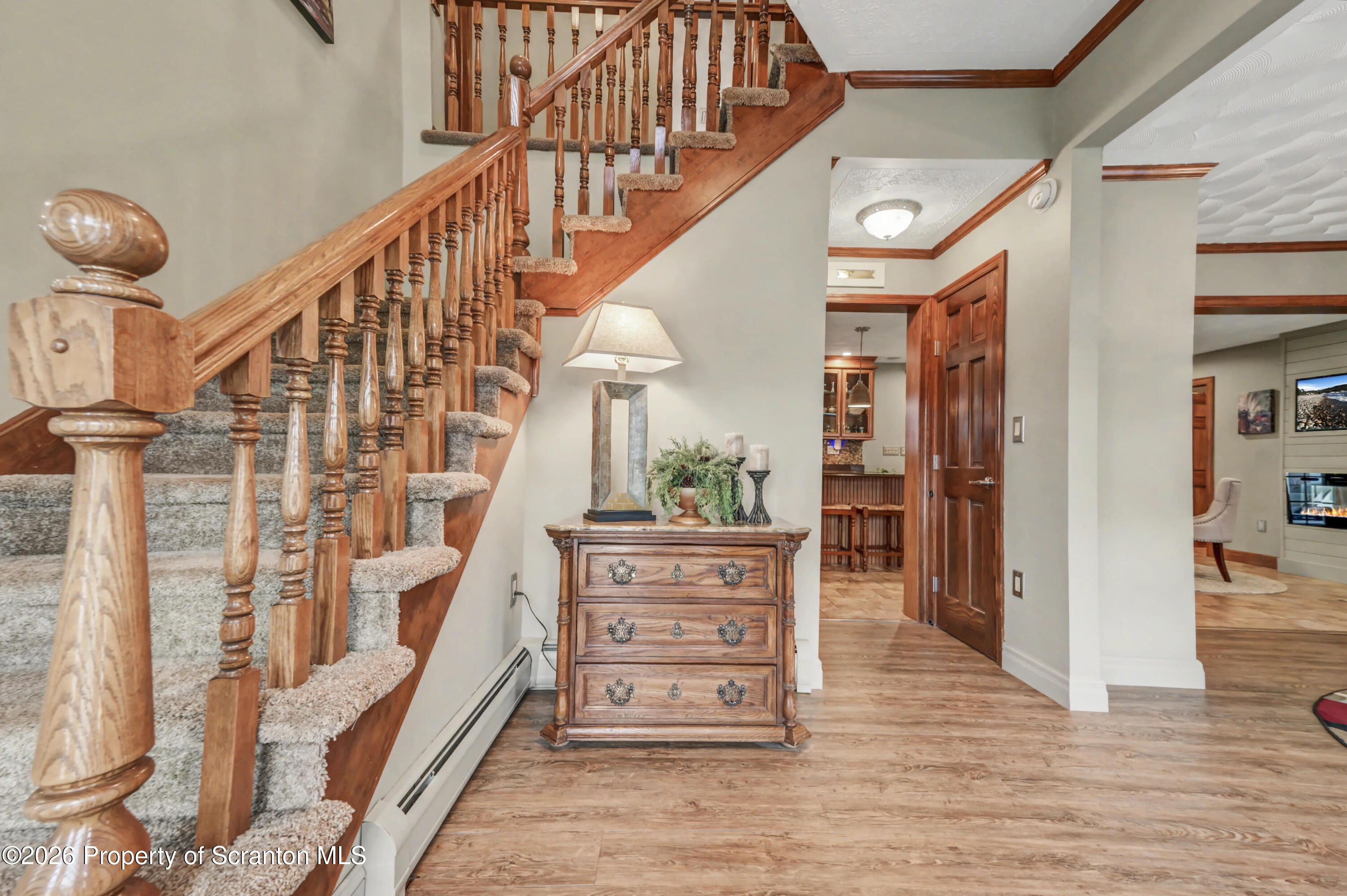 317 Bailey Street Clarks Summit, PA 18411 - Photo 8 of 95 a view of entryway and hall with wooden floor