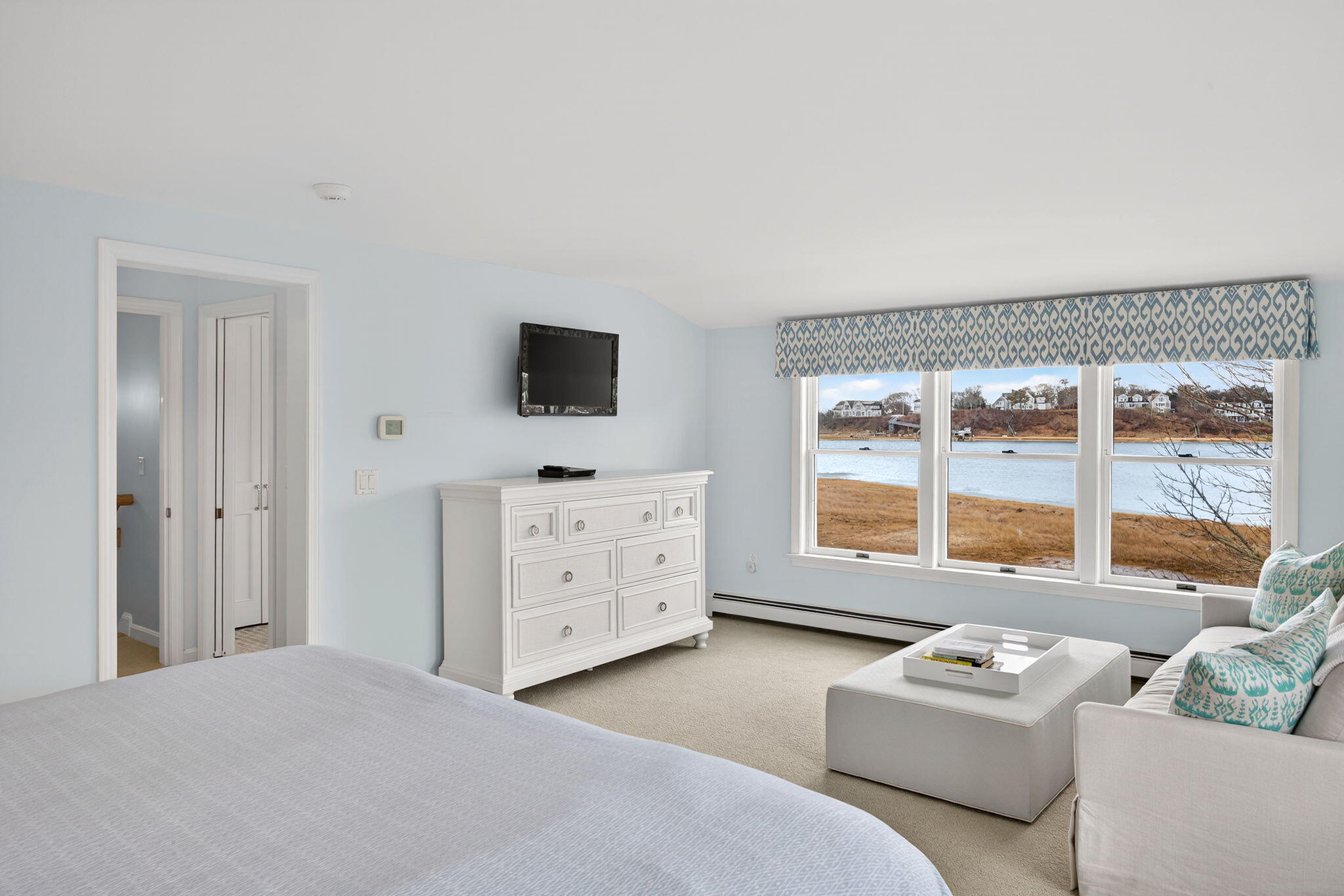 346 Morris Island Road Chatham, MA 02633 - Photo 24 of 33 a bedroom with furniture and large windows