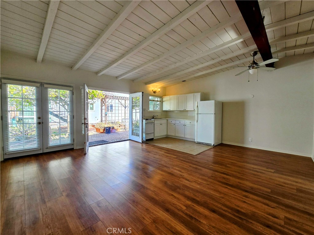 1416 Manhattan Avenue Manhattan Beach, CA 90266 - Photo 1 of 1 a view of empty room with wooden floor and fan