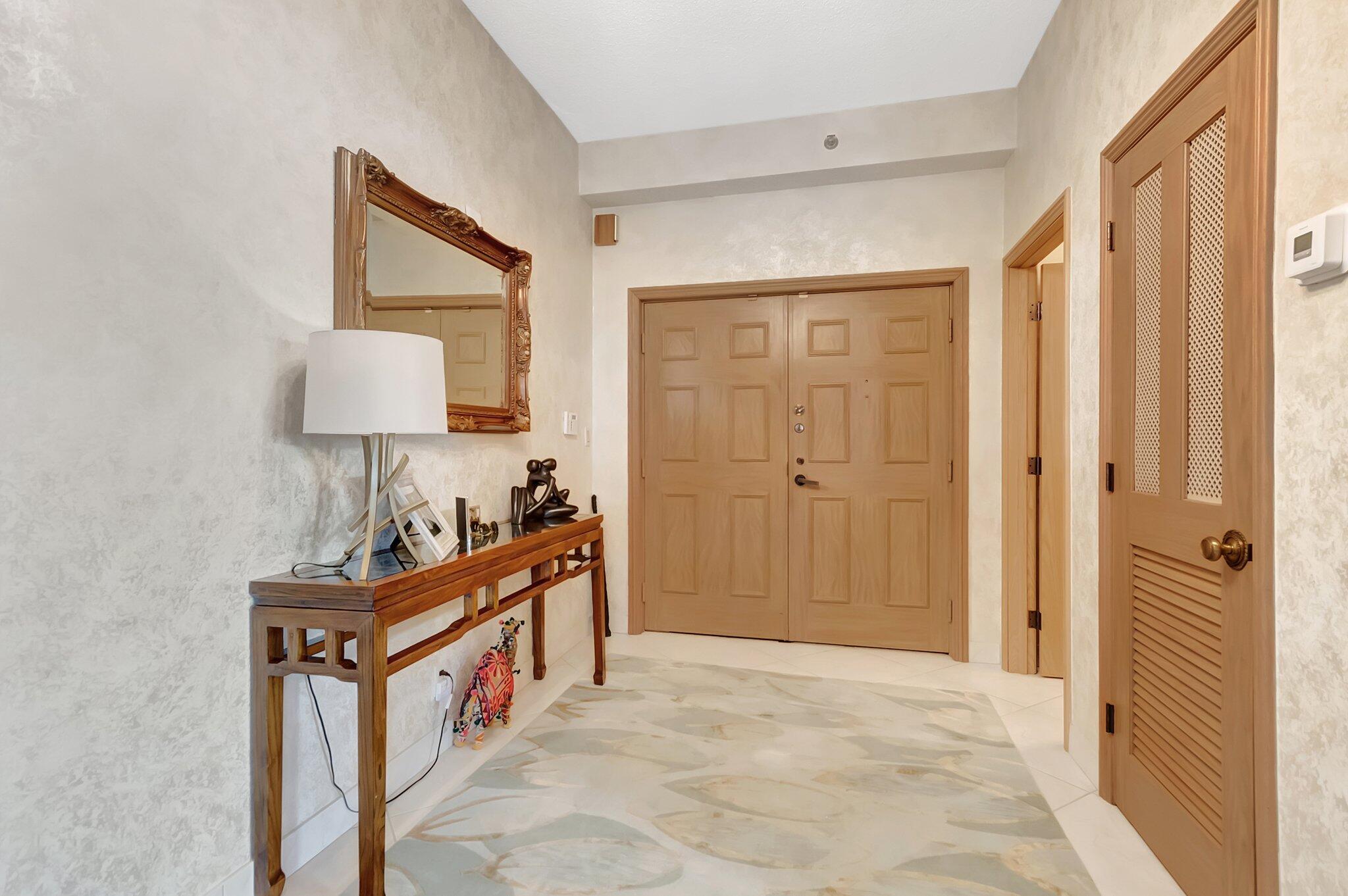 7235 Promenade Drive, Unit 802J Boca Raton, FL 33433 - Photo 3 of 49 Foyer