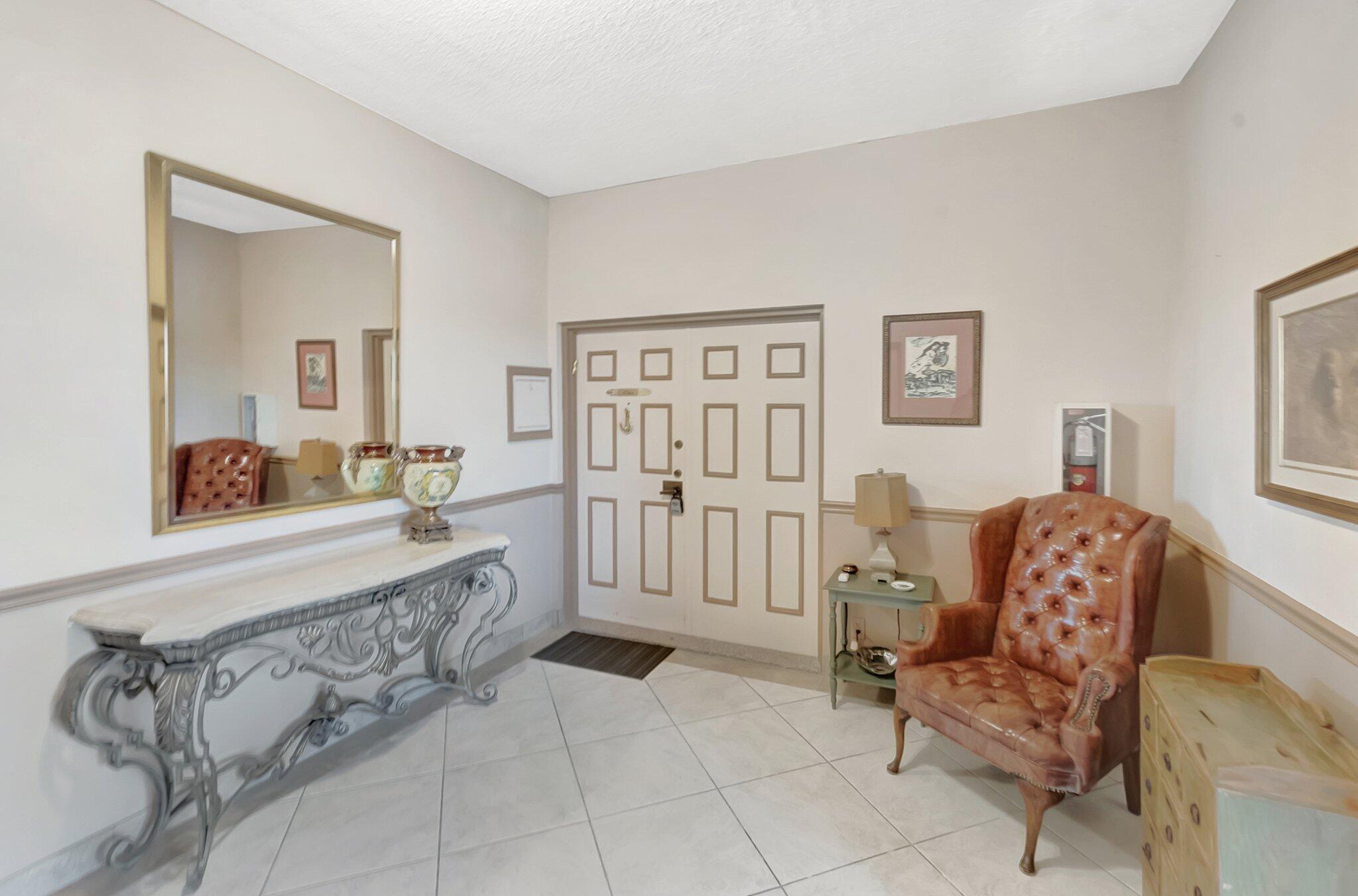 7235 Promenade Drive, Unit 802J Boca Raton, FL 33433 - Photo 35 of 49 Floor lobby
