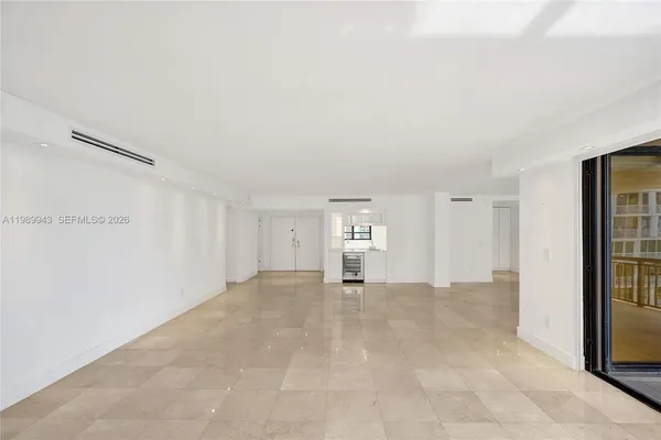 an empty room with a bathroom