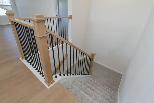 a view of a hallway with staircase