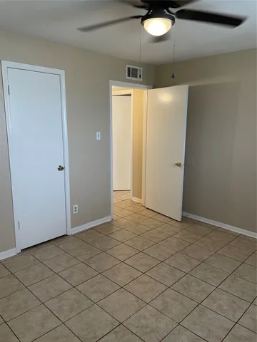 an empty room with a bathroom