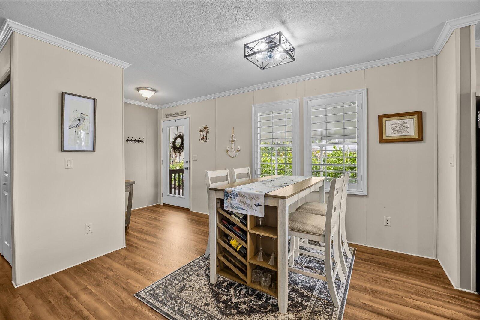 121 Southeast Paradise Place Stuart, FL 34997 - Photo 8 of 33 a view of a livingroom with furniture
