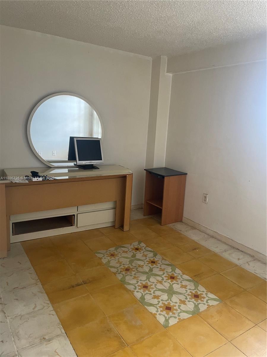 777 Southwest 9th Avenue, Unit 314 Miami, FL 33130 - Photo 6 of 8 a view of room with a sink