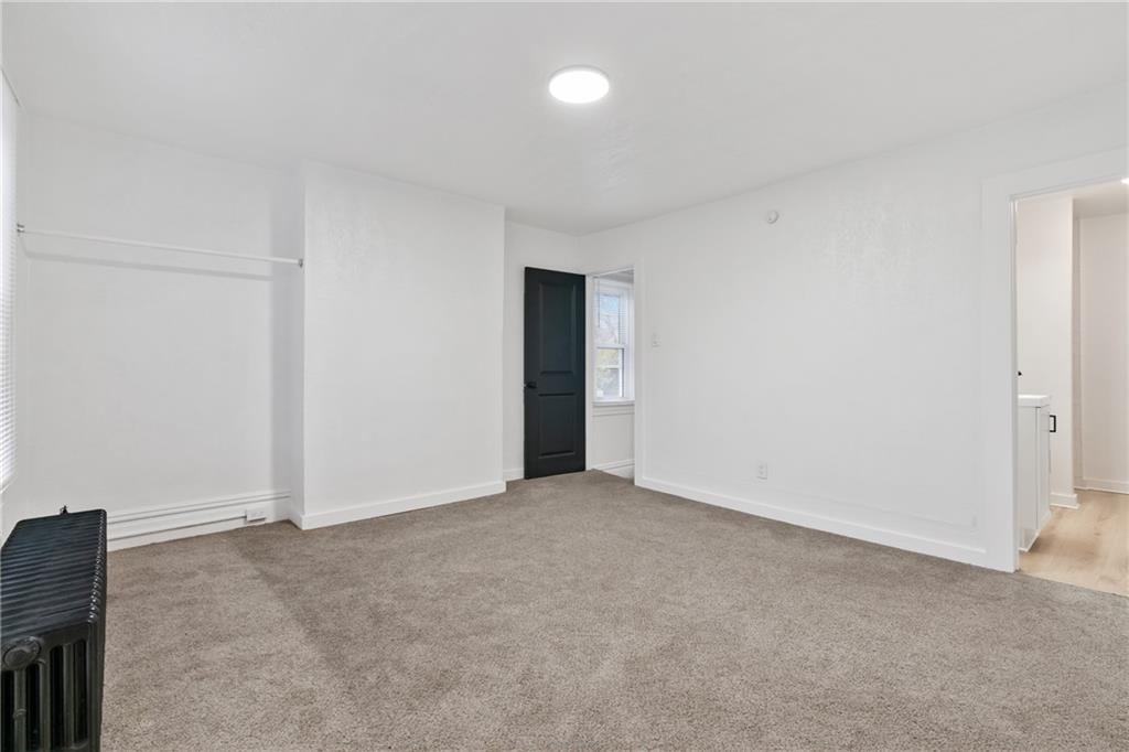 310 5th Avenue Braddock, PA 15104 - Photo 17 of 26 an empty room with an entryway