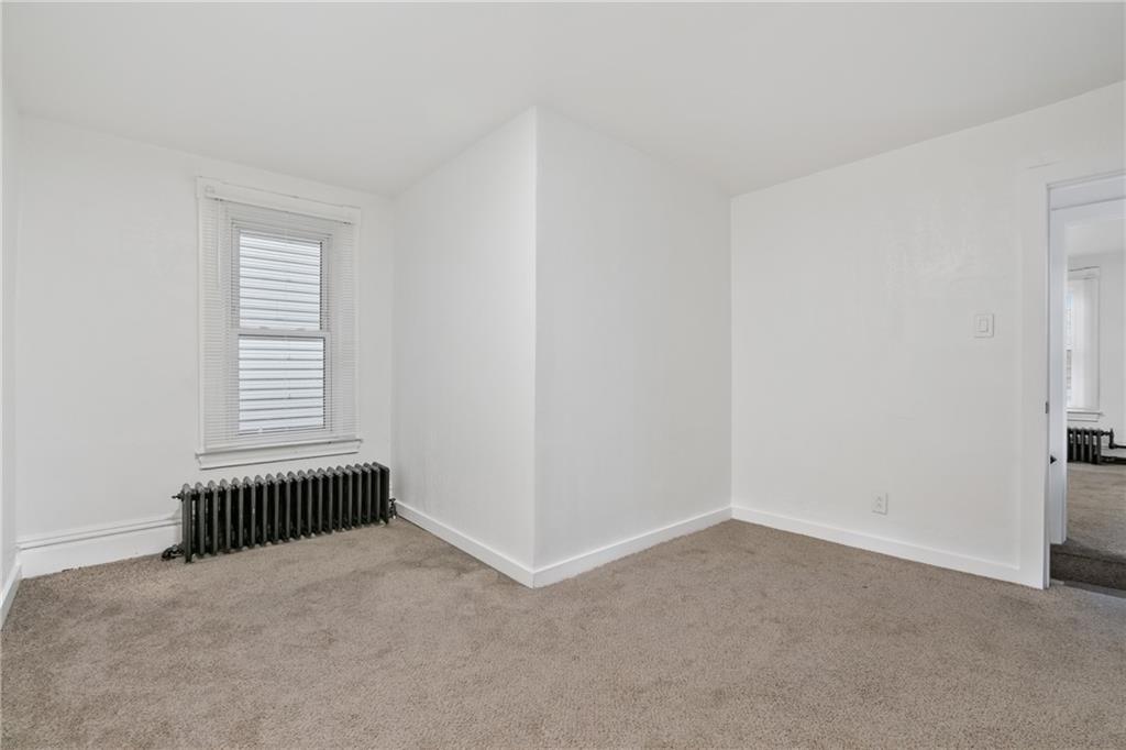310 5th Avenue Braddock, PA 15104 - Photo 19 of 26 an empty room with a window
