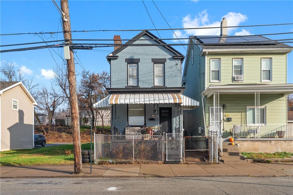 310 5th Avenue Braddock, PA 15104 - Photo 3 of 26 a front view of a building with street