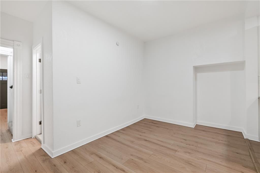 310 5th Avenue Braddock, PA 15104 - Photo 7 of 26 a view of wooden floor in an empty room