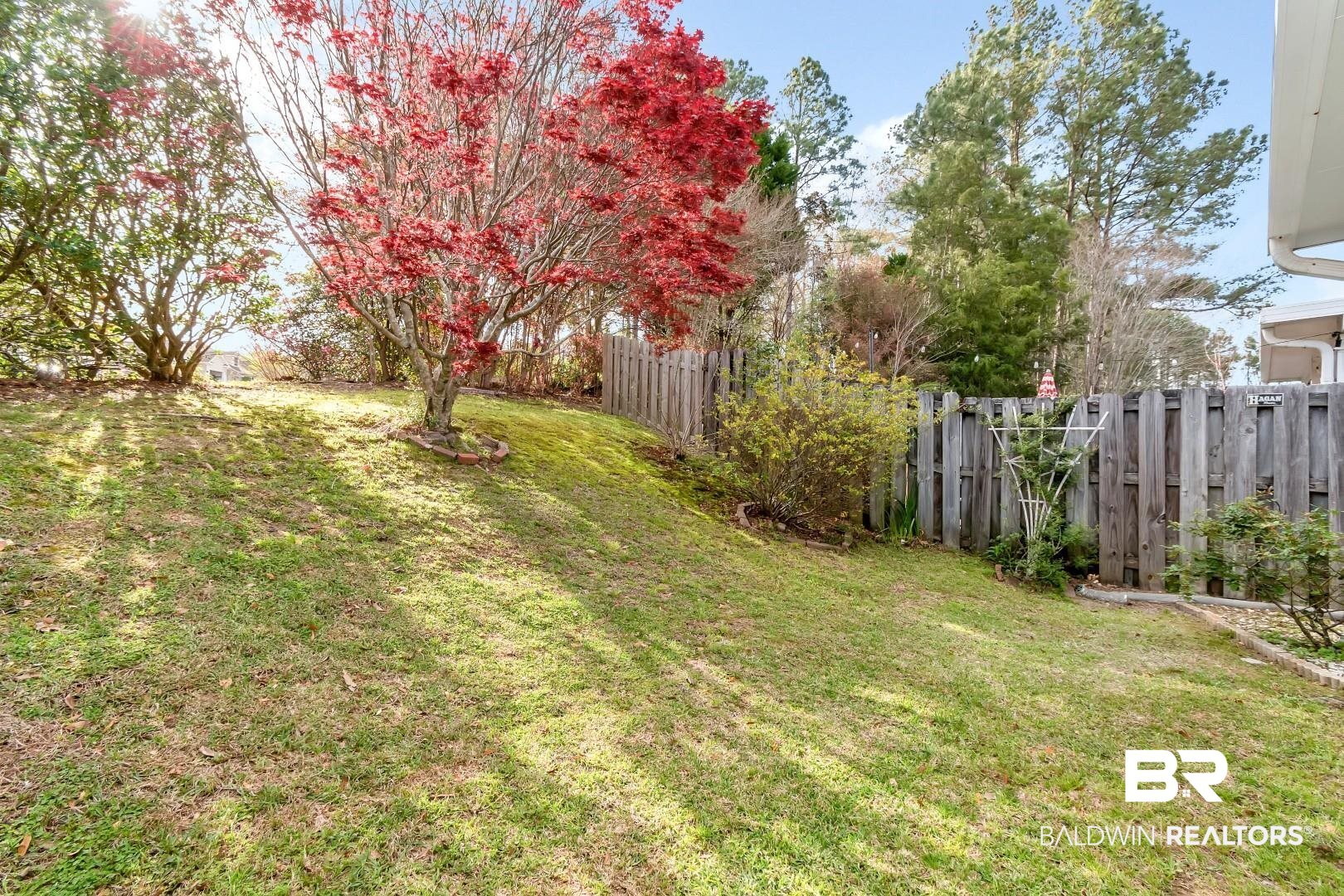 672 Spring Lake Drive East Mobile, AL 36695 - Photo 4 of 26 View of yard with fence