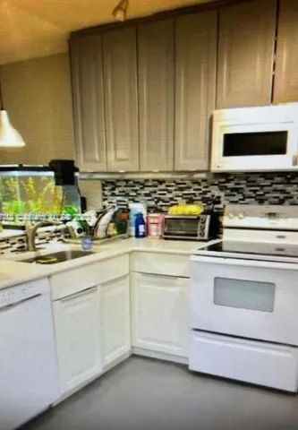 a view of kitchen and living room