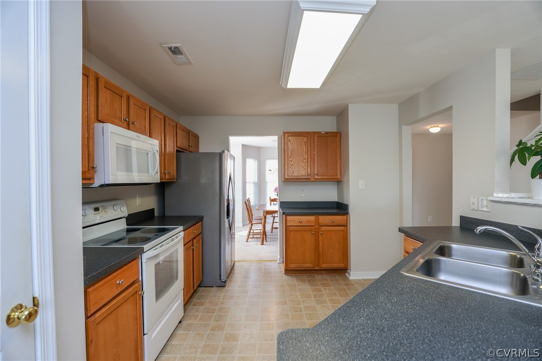 519 Ridgemoor Place Midlothian, VA 23114 - Photo 11 of 45 The Kitchen area includes a brand new refrigerator