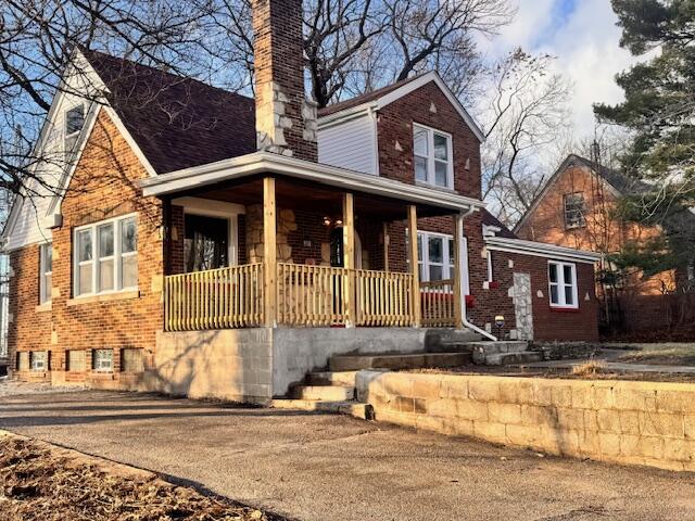940 Idaho Street Gary, IN 46403 - Photo 1 of 32 a front view of a house with a yard
