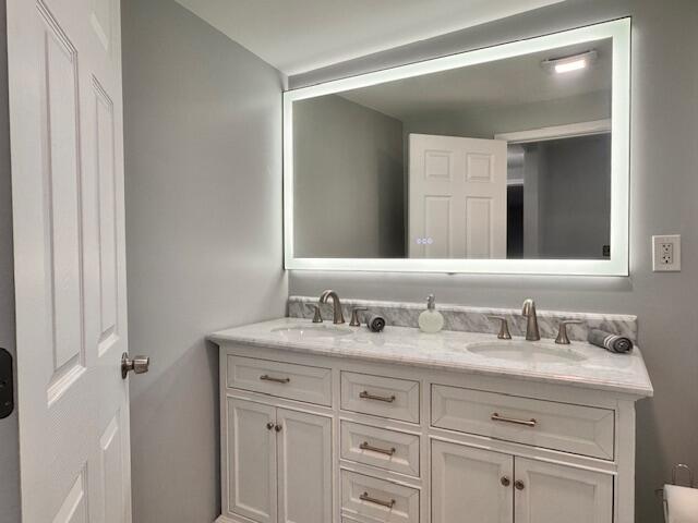 940 Idaho Street Gary, IN 46403 - Photo 20 of 32 a bathroom with a sink and a mirror