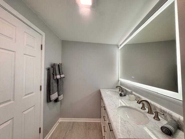 940 Idaho Street Gary, IN 46403 - Photo 23 of 32 a bathroom with a sink and a mirror