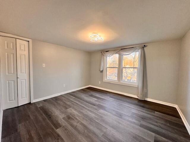 940 Idaho Street Gary, IN 46403 - Photo 24 of 32 an empty room with wooden floor and windows