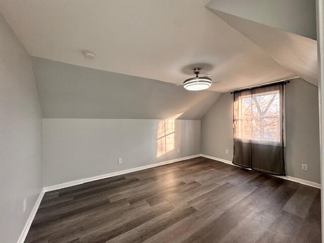 940 Idaho Street Gary, IN 46403 - Photo 28 of 32 an empty room with wooden floor fan and windows